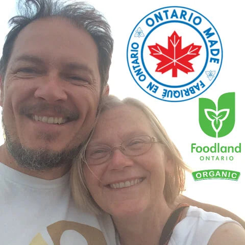 Two people smiling with 'Ontario Made' and 'Foodland Ontario Organic' logos in the background.