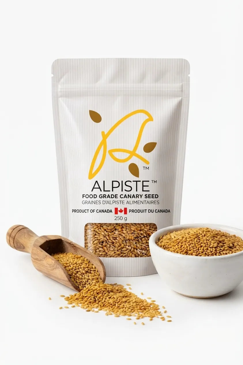Annanda Alpiste with bowl of alpiste seedss and wooden spoon