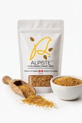 Annanda Alpiste with bowl of alpiste seedss and wooden spoon